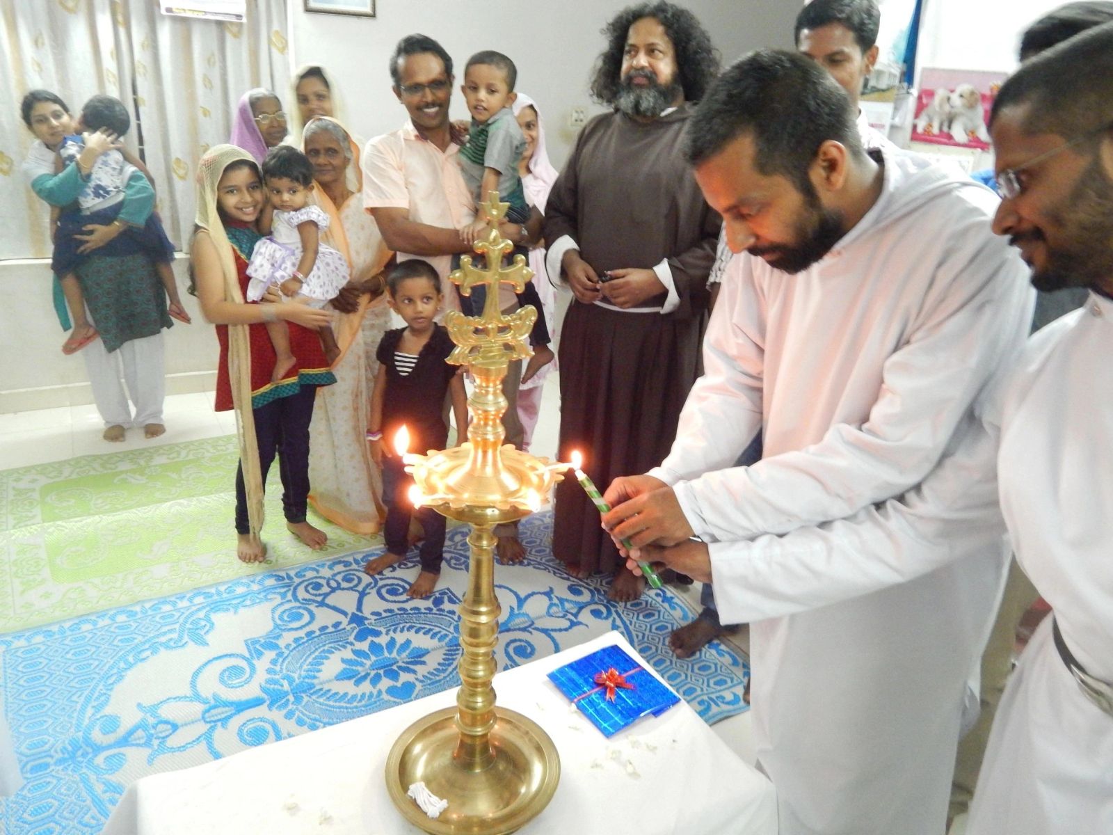 Families and children at a LEAD Foundation lamp lighting ceremony